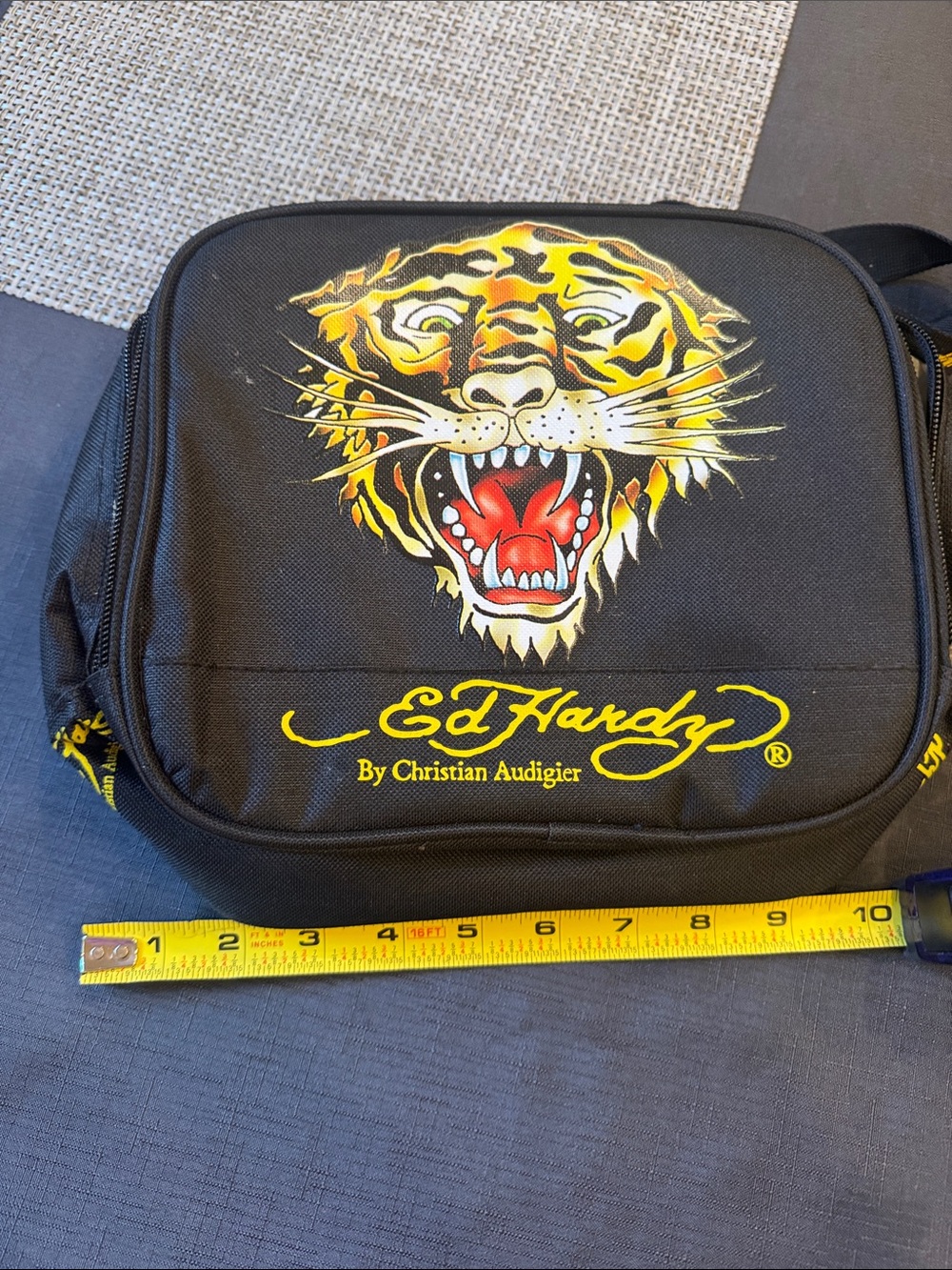 Christian Audigier Black soft lunchbox with Yellow & Red Tiger Graphic.
